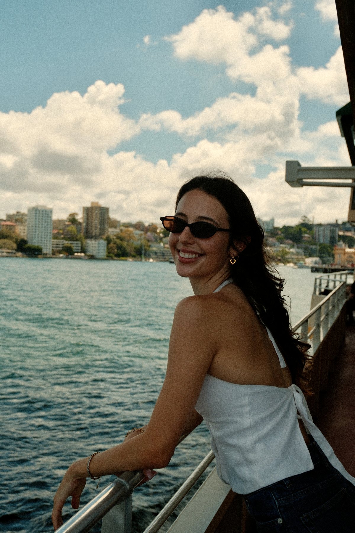 Luiza smiling on the harbour in Sydney